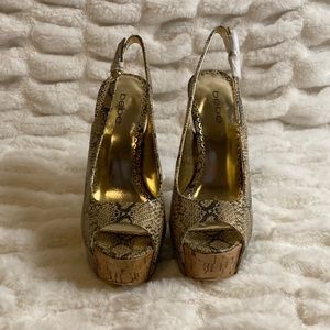 Bebe snake skin sling back peep toe heel